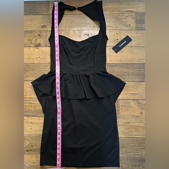 BEBE Black Peplum Bodycon Cocktail Mini Dress Open Back Sweetheart Neckline - Picture 13 of 13